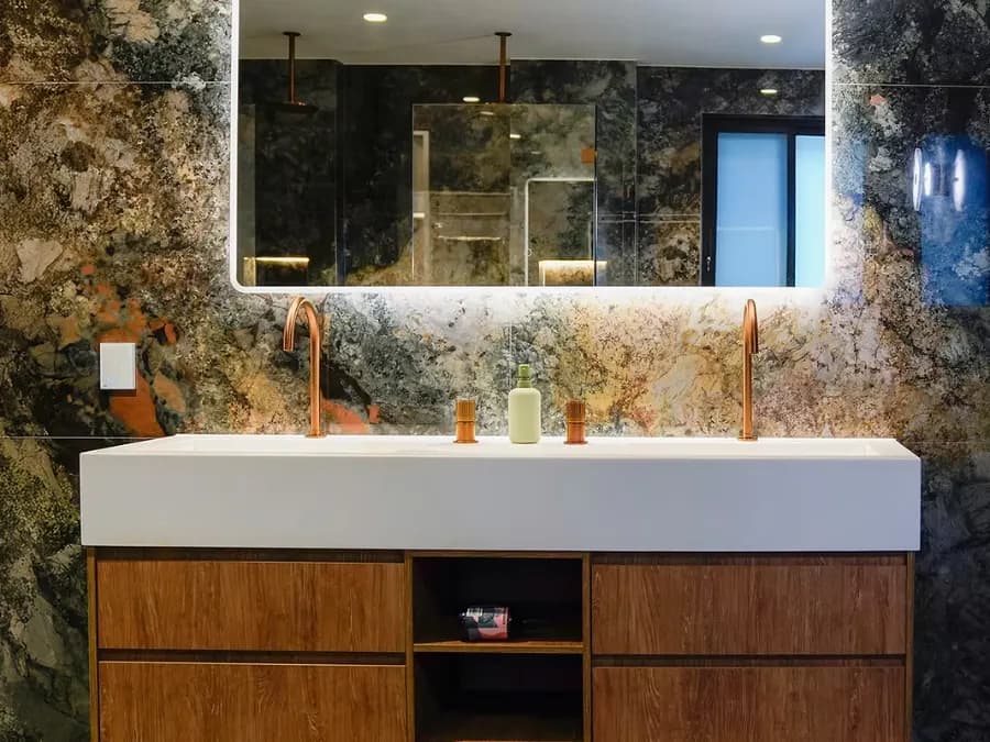 Completed bathroom with double vanity and copper tapware